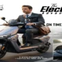 Professional riding an EV Sports electric scooter featuring a smart digital dashboard, premium design, and eco-friendly performance for fast and reliable daily office commuting.